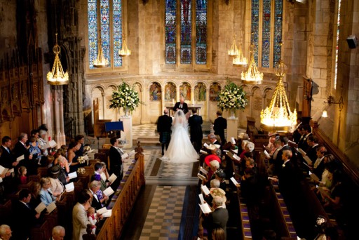 Photo of a wedding ceremony taking place in a Scottish cathedral